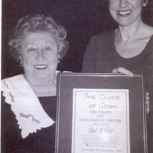 Babette Stephens presents Sue Rider with the Glugs of Gosh Excellence in Theatre Award for 1996.