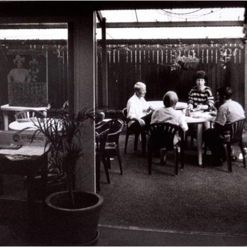 Staff meeting in the courtyard, early 1990s.